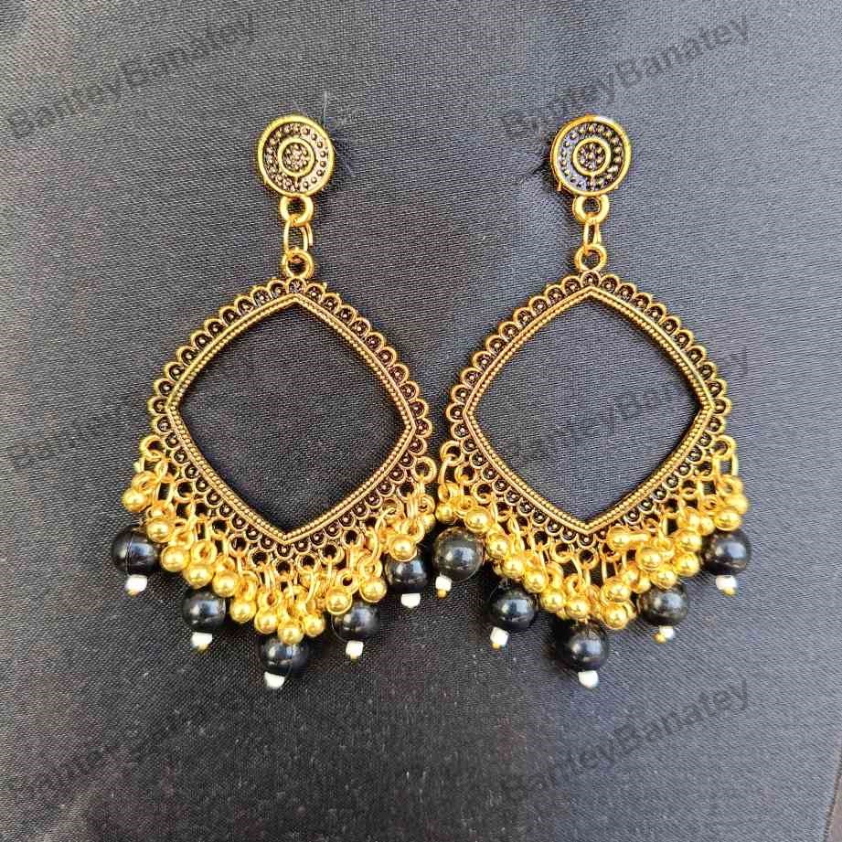Golden kite shape with black beads (1)
